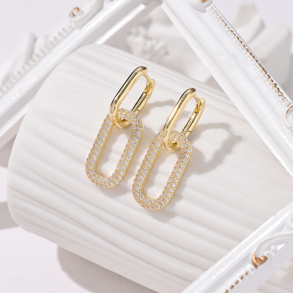 Delicate and petite openwork cross earrings